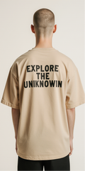 Men’s Oversized Sand Beige T-Shirt – “EXPLORE THE UNKNOWN” Travel Map Graphic Tee