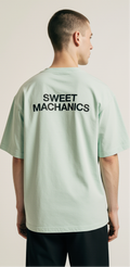Oversized Mint Green Gingerbread T-Shirt – Sweet Mechanics Graphic Tee – Unisex Holiday Streetwear